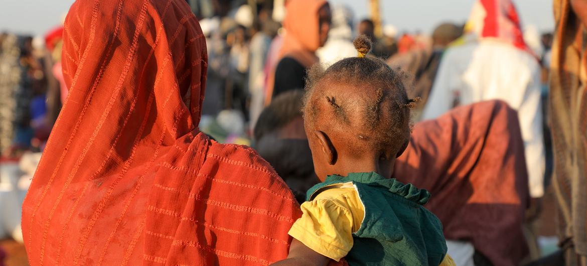 Families arrive at a transit centre in Renk, South Sudan, after fleeing escalating violence in Sudan. Families arrive at a transit centre in Renk, South Sudan, after fleeing escalating violence in Sudan.