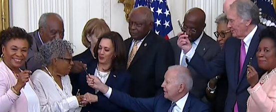 President Biden signing legislation to declare Juneteenth a federal holiday